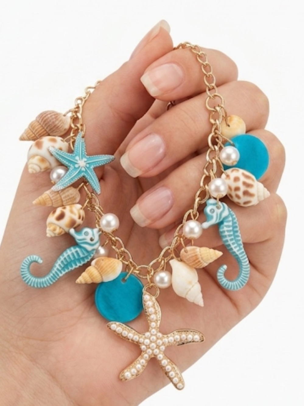 NWT Boho Ocean Shell Charm Bracelet Gold Tone Teal Starfish Seahorse Beach 
C3